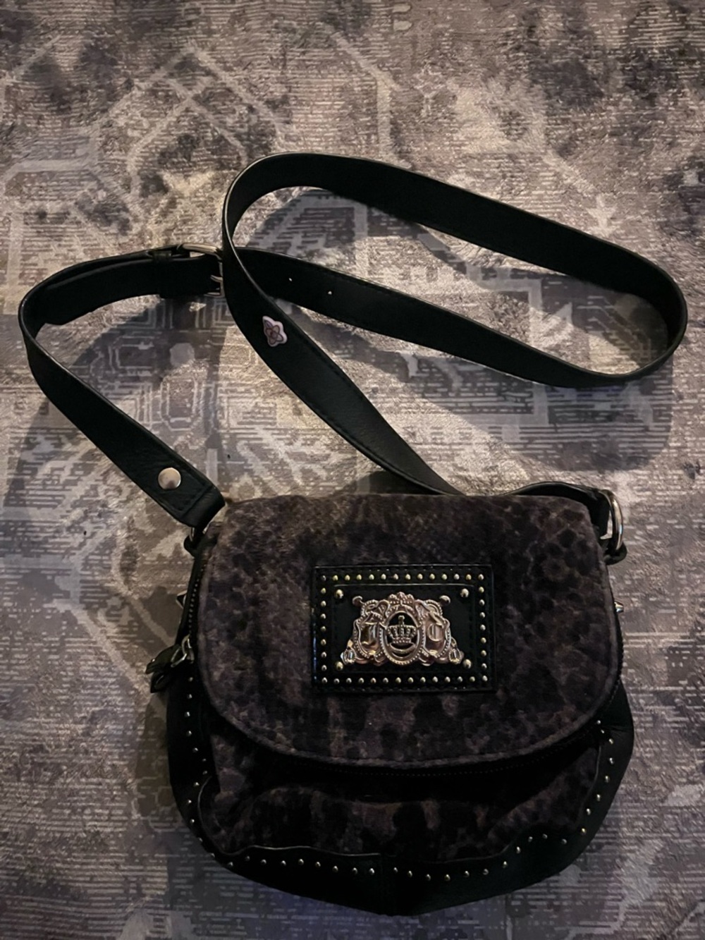Black Leopard-Print Crossbody Bag with Decorative Crest Accent